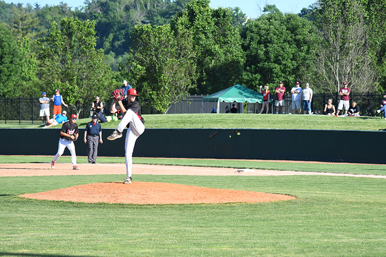 Steubenville starting pitcher Calvin Bickerstaff delivers a pitch in the sixth inning of Thursday nights 4-1 regional tournament win over John Glenn.