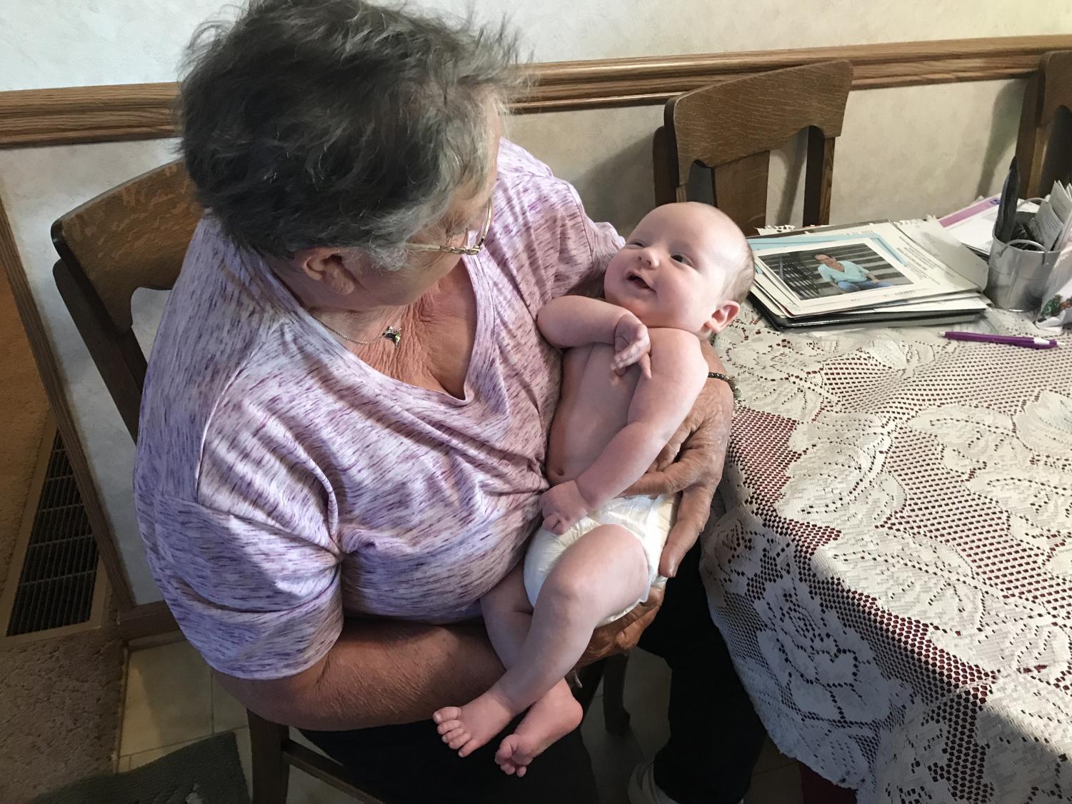 Phyllis Shoemaker holds her seven-week old great-grandson, Eric. Eric's mother has tested negative for Huntington's disease.