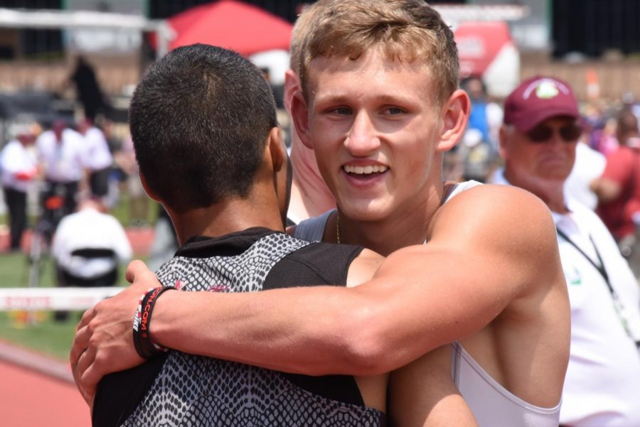 Ethan+Tabor+%28right%29+embraces+Jacob+Clifford+%28left%29+after+Cliffords+300-meter+hurdles+win+at+the+OHSAA+state+track+tournament+Saturday.