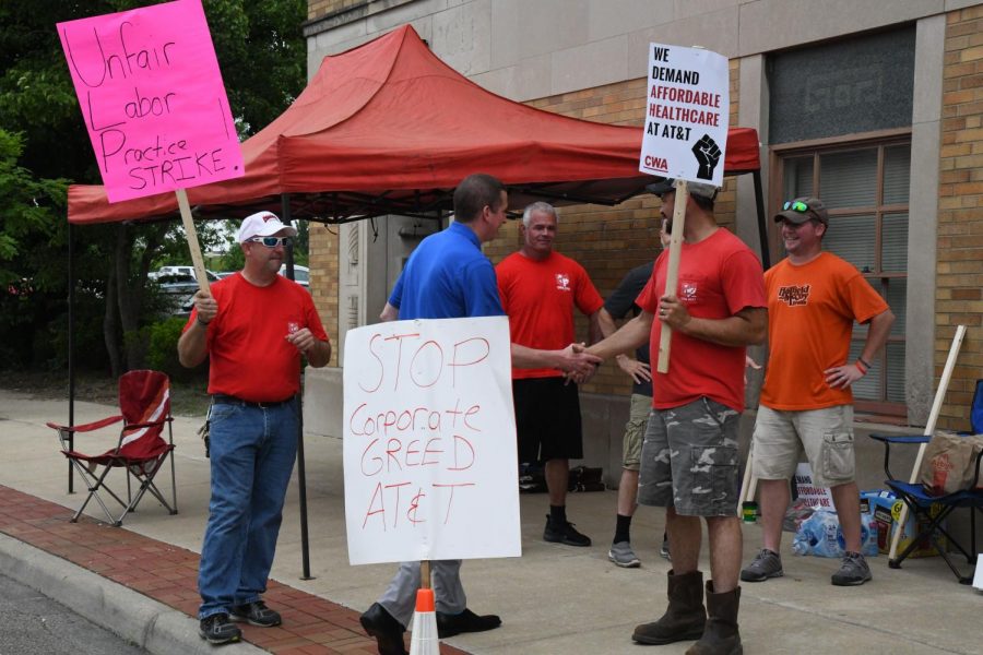 Local AT&T employees returning to work, filing charges
