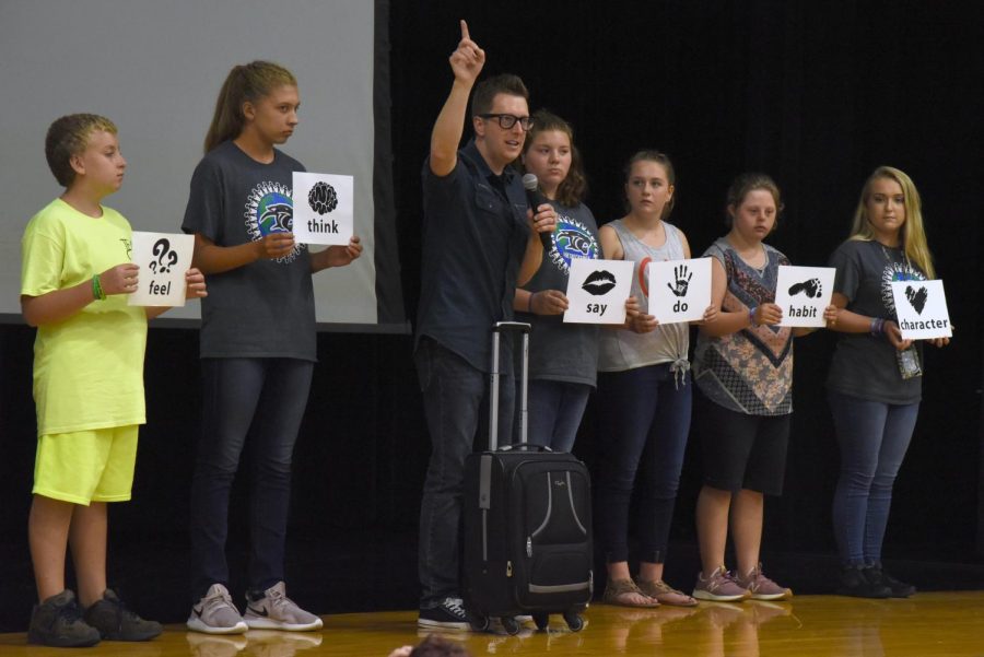 Tom Thelen demonstrates ways to combat bullying using the help of students.