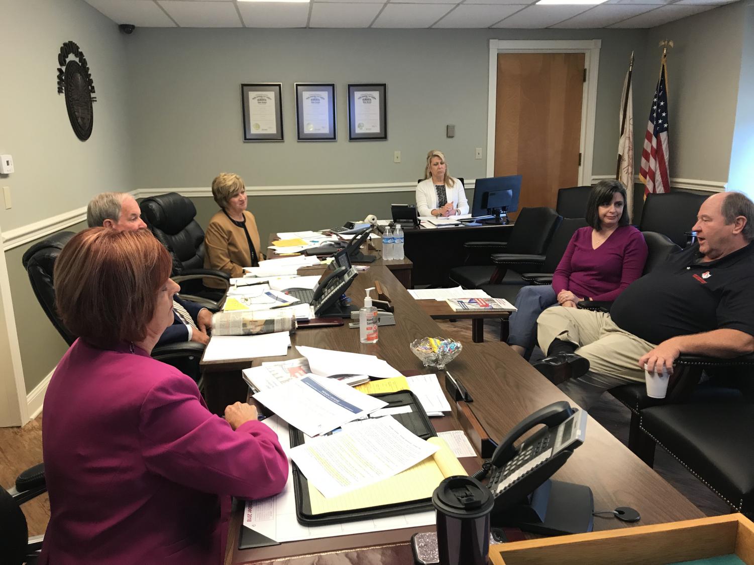 Representatives from the County Commissioners Association of Ohio meet with the Muskingum County Commissioners Thursday, Oct. 12.