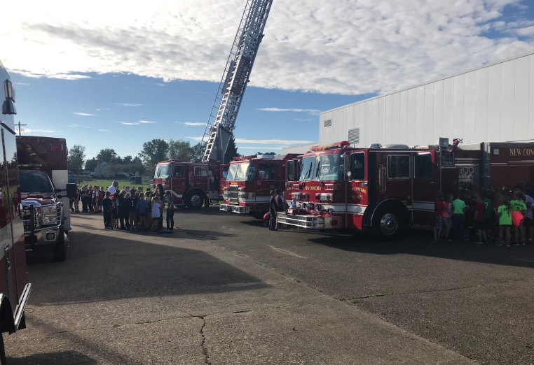 New Concord Fire Department staff interacts with children from Larry Miller Intermediate Elementary School during Fire Prevention Week. Photo provided by the New Concord Fire Department via Twitter.
