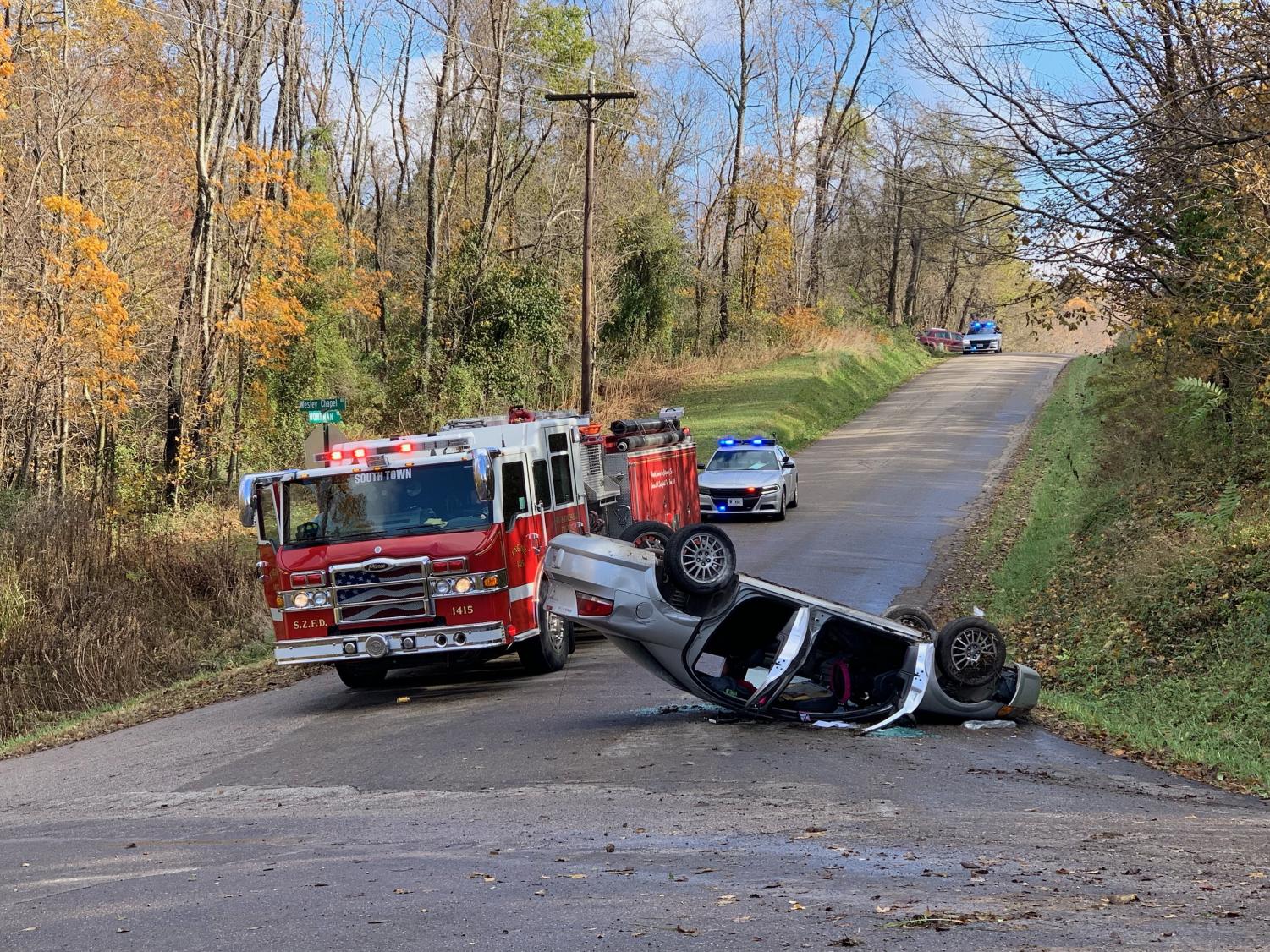 Woman trapped in car after rollover accident – Y-City News