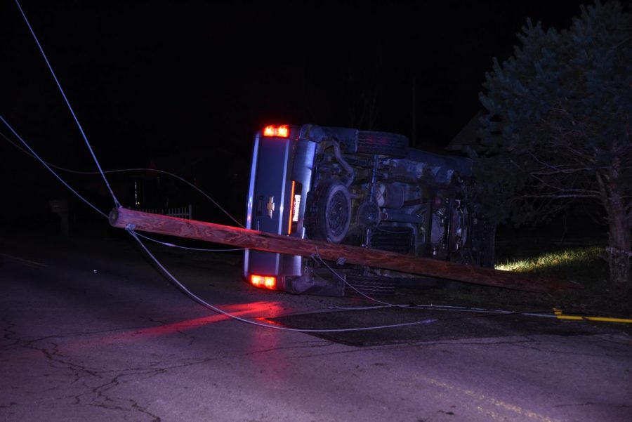 Man trapped in car after rollover accident