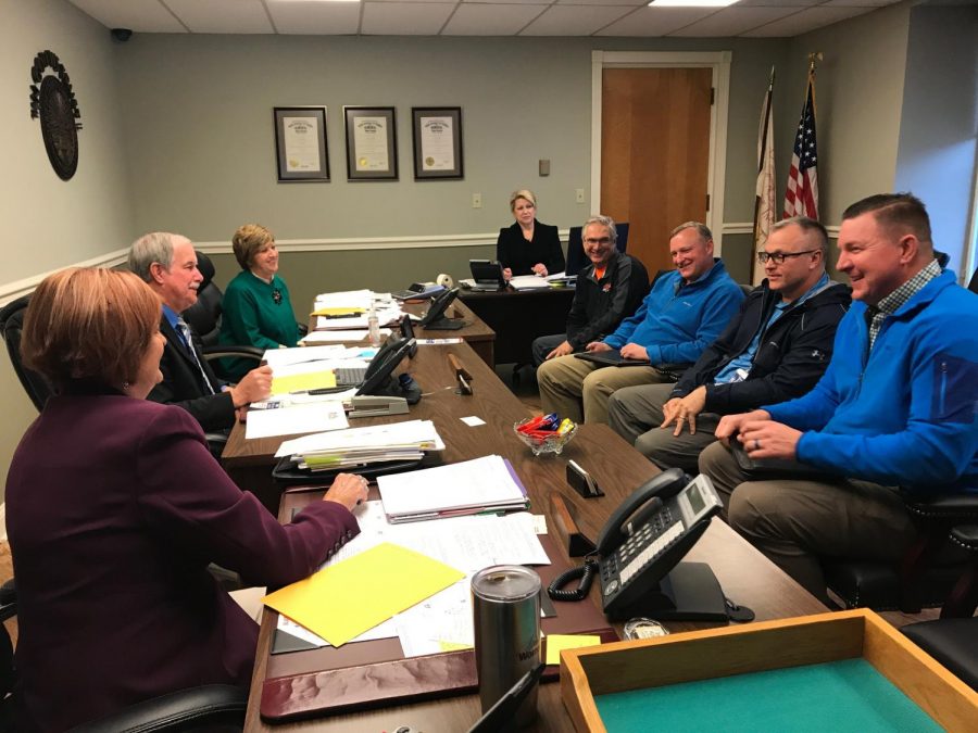 Representatives from AEP and the Muskingum County Engineer meet with commissioners to discuss Northpointe access road agreement.