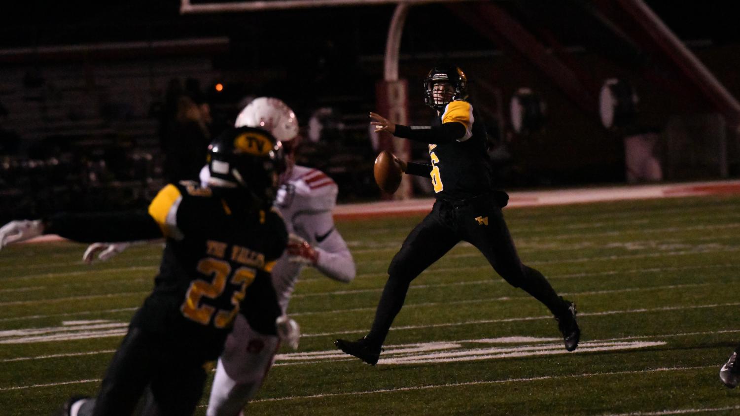 Tri-Valley senior quarterback Luke Fargus attempts a deep pass to wide receiver Rob Wachter in the first half of Friday night's 13-3 loss to Wadsworth.
