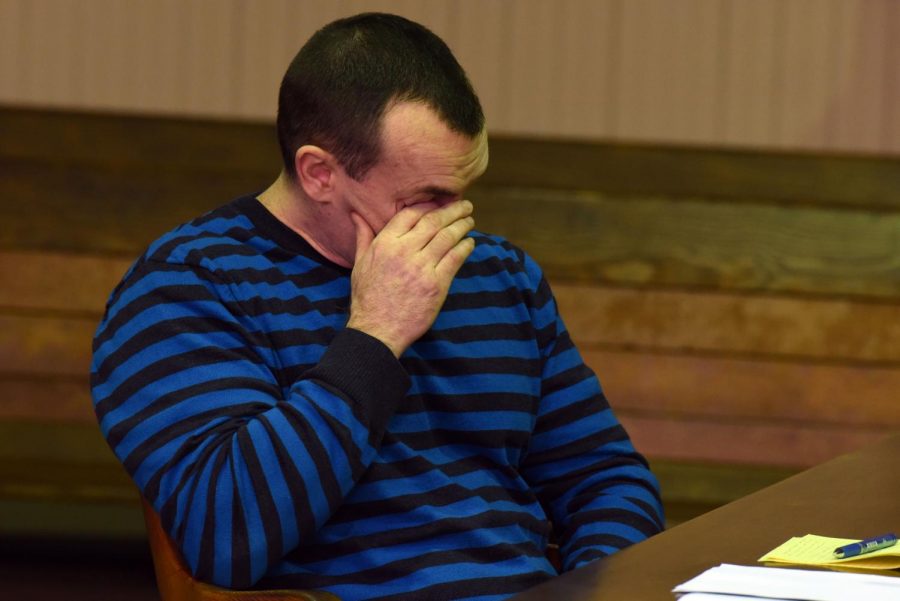 John J. Iden, Jr. becomes emotional while his defense attorney, Jeff Blosser, presents his closing statement on Monday.