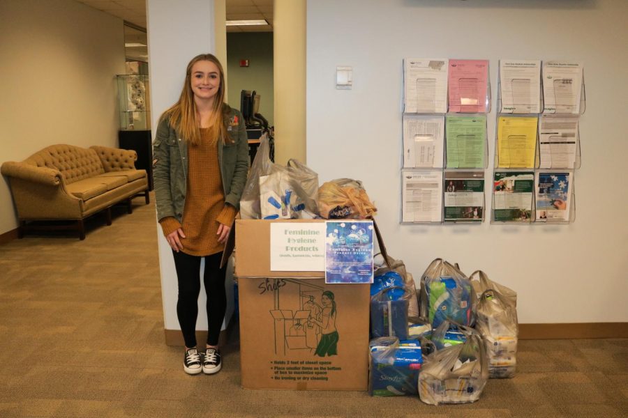Kassie Settles, a member of the Ohio University Student Social Work Association, led the first phase of the drive to collect product for the Transitions Shelter. Photo provided by Holly Voltz.
