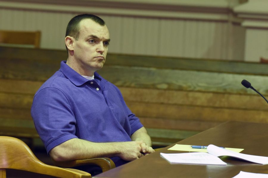 Defendant John Iden listens to a witnesses during cross-examination Wednesday afternoon. 