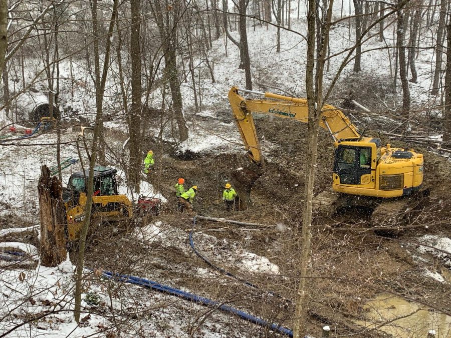 Crews from Zemba Bros are on scene repairing the broken sewer line.