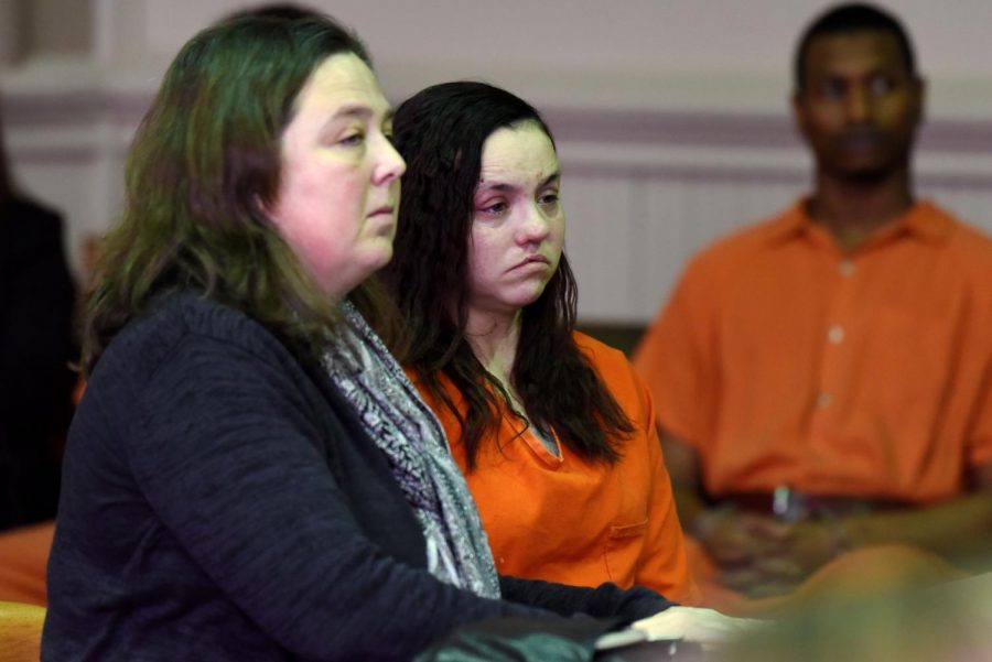 Samantha Donohoe (left) appears before Judge Mark Fleegle in the Muskingum County Court of Common Pleas for her competency hearing on Wednesday alongside her defense attorney Holly Hanni.