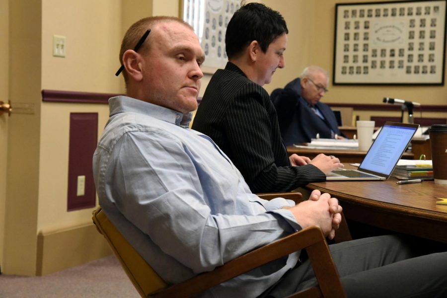 Joseph Hodge listens to Assistant Prosecuting Attorney John Litle as he questions a witness Wednesday.