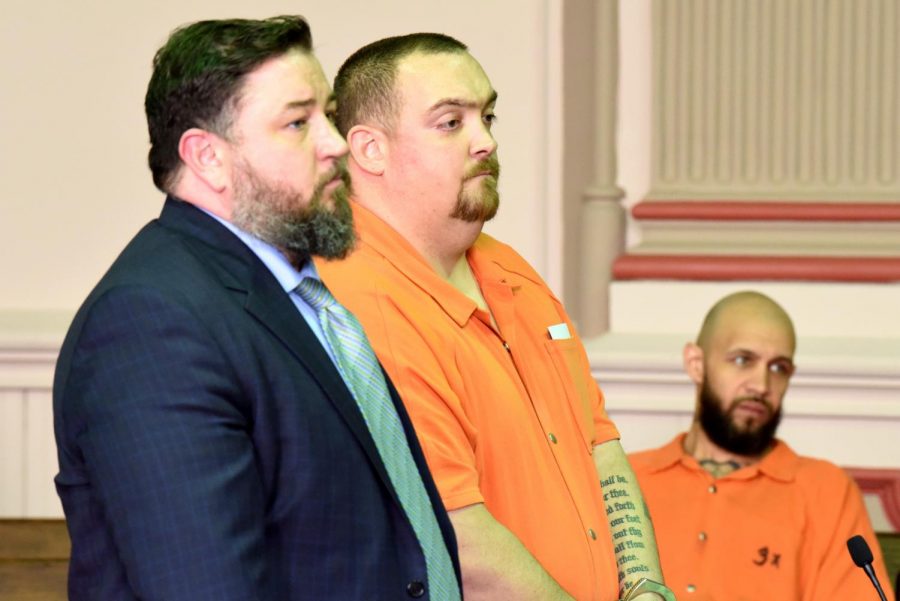 Michael Law (right) stands alongside his defense attorney Terry Rugg (left) during his sentencing hearing in the Muskingum County Court of Common Pleas Monday afternoon.