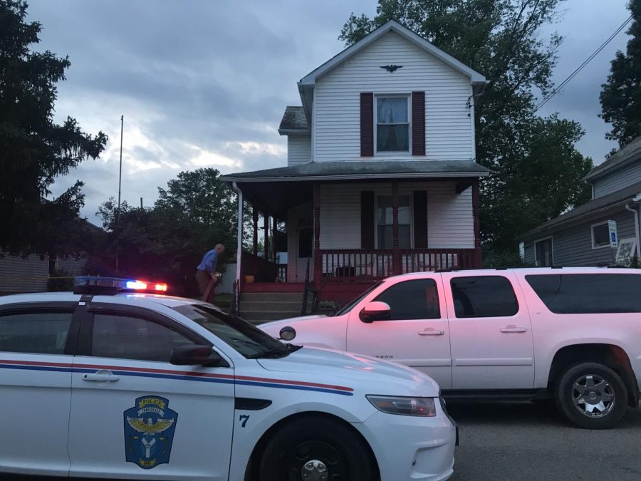 Muskingum County Coroner Charles Feicht approaches 479 Spangler Dr. Wednesday evening. 