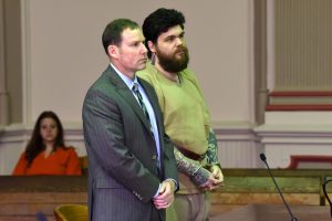 Timothy Mayle stands alongside defense attorney David Mortimer before pleading guilty to three felonies in common pleas court.