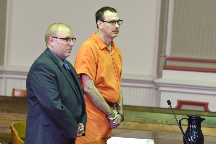 Larry Mitchell pleads guilty to reduced charges after being accused of raping his ex-wife during his hearing on June 3.