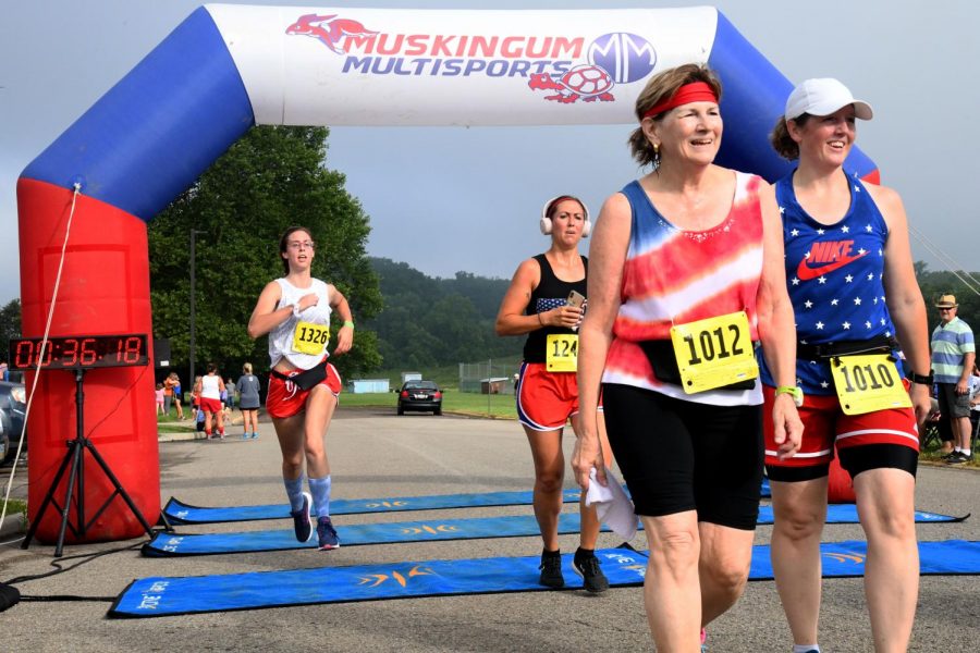 About 222 of the 269 registered participants checked into the Red White & Run Thursday.