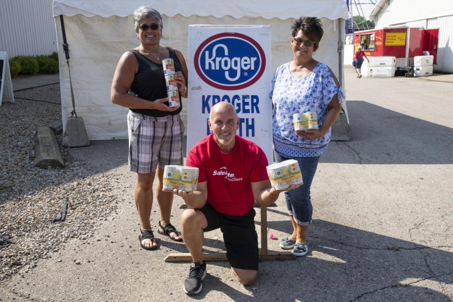 Pictured left to right are Marti King of Kroger, Al Morgan of Safelight AutoGlass and Keely Warden of Christs Table. 