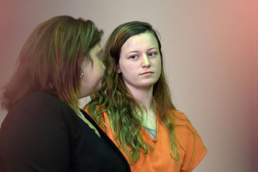 Rachel Sipple, 20, turns to her defense attorney, Kendra Kinney, during her plea hearing in Muskingum County Court of Common Pleas on Sept. 11.