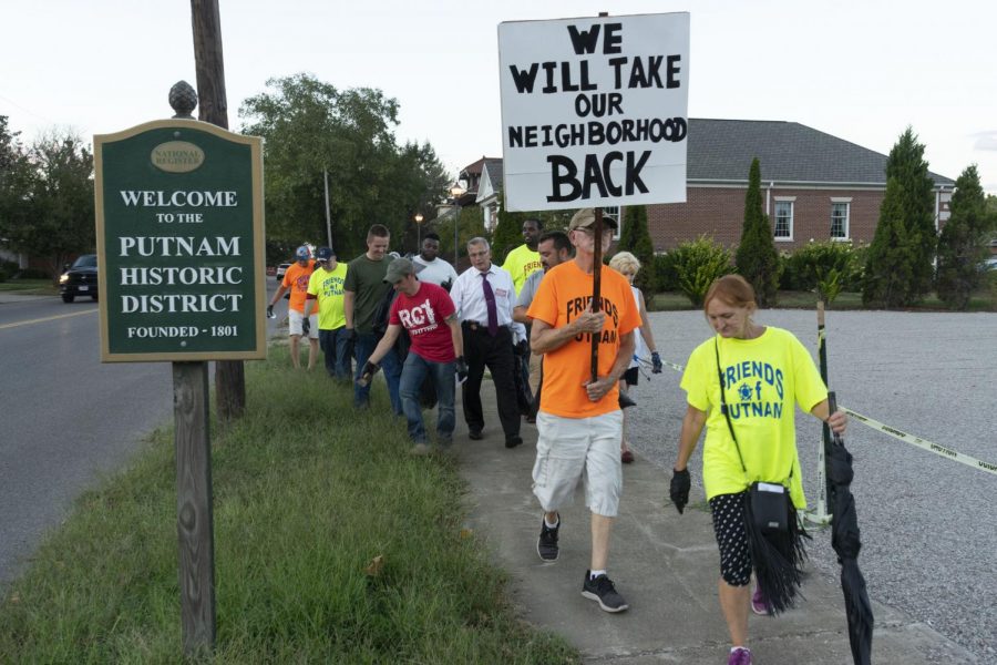 Community group floods Putnam with message of determination backed by action