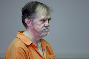 Stephen Mills looks at Judge Mark Fleegle as he is sentenced to prison on sex-related charges. 