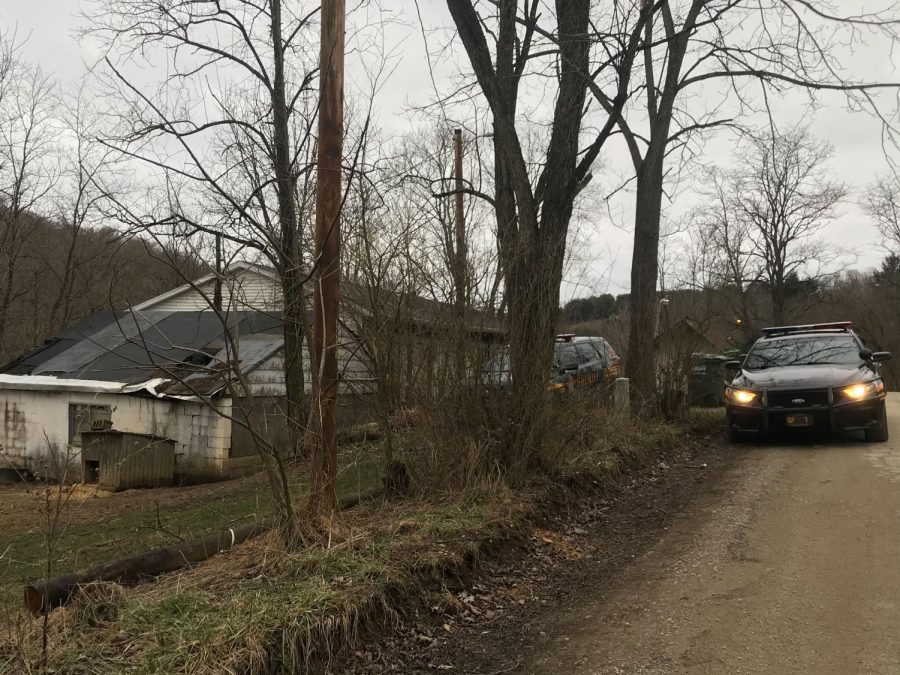 Law enforcement search a home on Macedonia Road in Hopewell where the shooting occurred. 