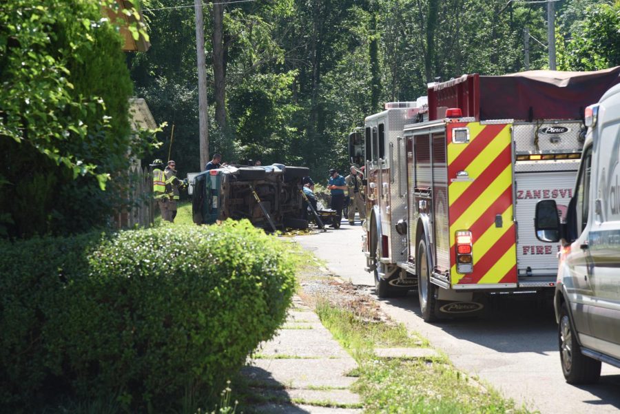 Man sent to hospital following rollover