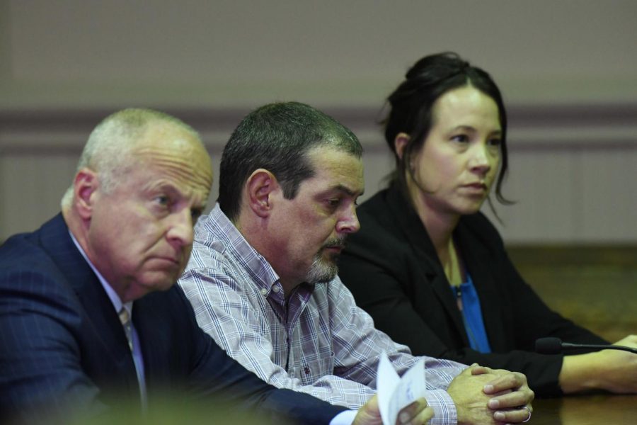 Eric Milliken (center) looks down as he hears the verdict read that he is found guilty on all criminal counts. 