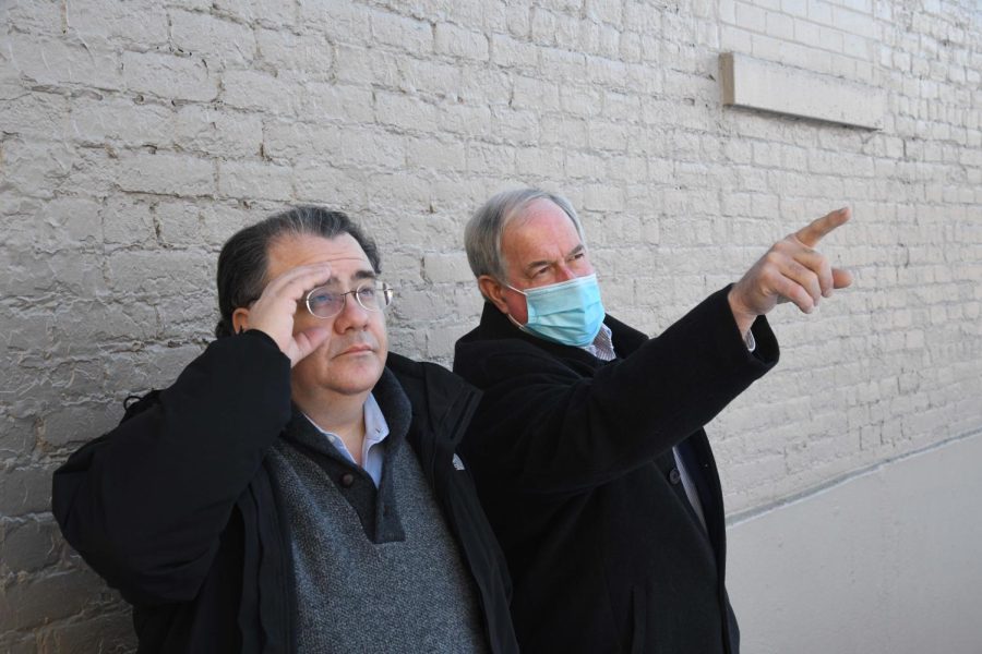 State Senator Tim Schaffer (left) is shown the extensive damage to the Masonic Temple by Muskingum County Commissioner Jim Porter (right) Friday afternoon before demolition began. 