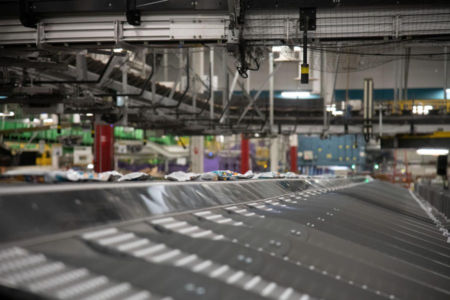 Packages roll down the conveyor belt on the new SIPS Machine, which sorts parcels intended for destinations all around the country.